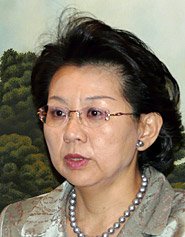 香港経済の最新動向を説明する日本主席代表の古田茂美氏